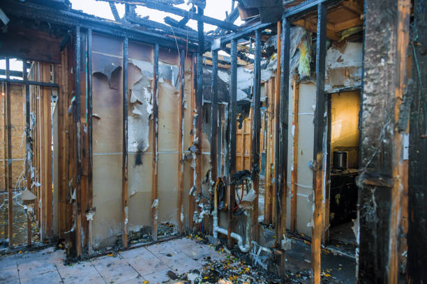 Professional Fire Damage Restoration technician working in Bay, AR